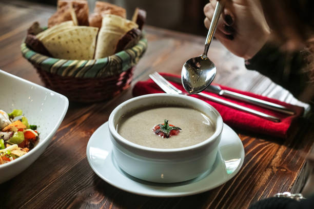 istock Steaming Bowl of Soup With Spoon 2151382965