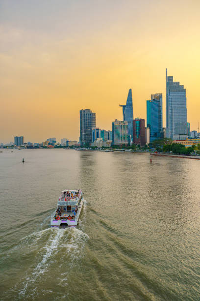 istock Bitexco Tower, captured from the perspective of Ba Son Bridge, frames a breathtaking sunset over Ho Chi Minh City. 2151383617
