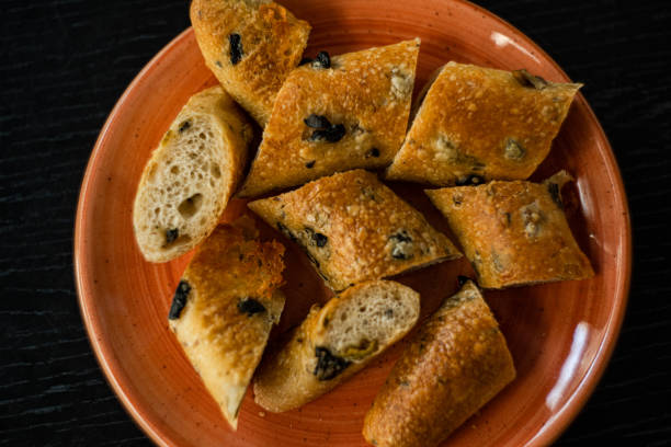 istock Sour dough bread with olives and cheese 2151393763