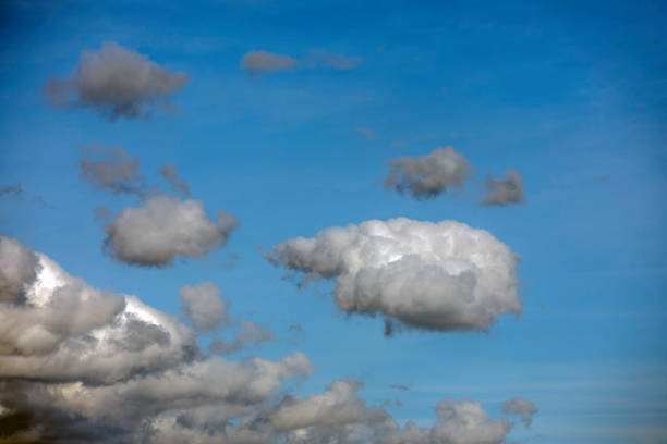 Gaps between clouds revealing a dark starry sky, used in motivational content and romantic travel themes.
