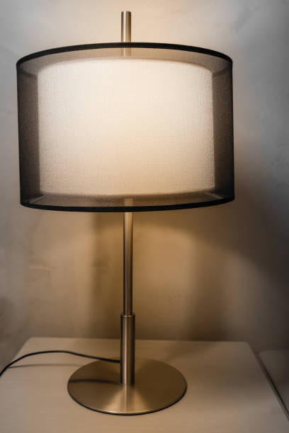 istock Night light lamp on the bedside table in the bedroom, interior lighting design element for a cozy atmosphere 2151395665