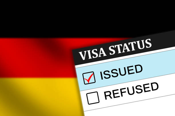 istock Germany visa issue with red tick in the box, waving flag in the backdrop 2151396732