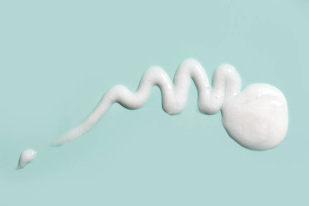 istock Cosmetic cream gel texture on green background 2151398348