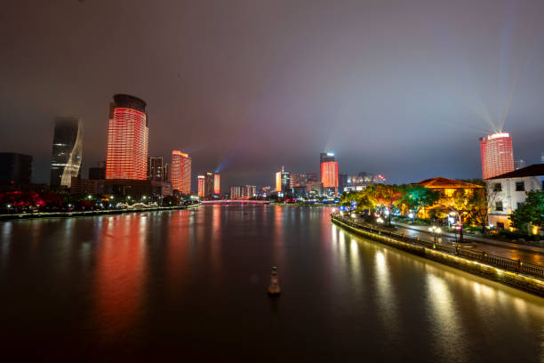 istock Modern urban riverside architecture night view 2151403423