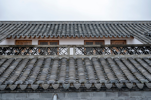 Terracotta tiles on the house rooftop.