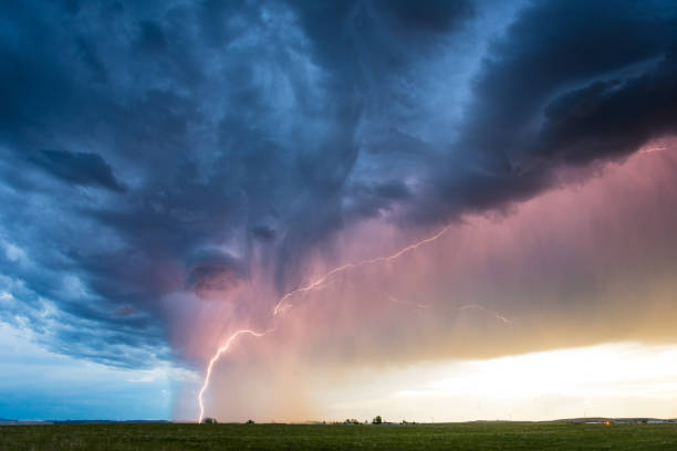 istock Huge Lightning Bolt Lights Up Storm Clouds Amazing Colors 2151404730