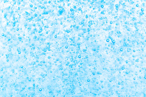 istock Water bubbles abstract background. Closeup of blue water bubbles. 2151412302