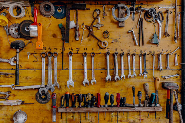 istock The tools of a workshop hanging on a wooden panel 2151416625