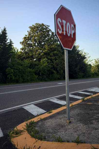 istock Stop sign at a crossroads 2151420183