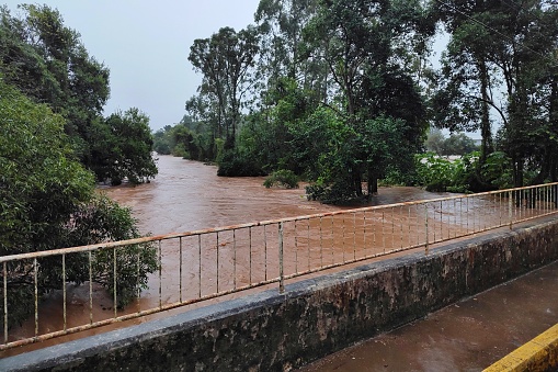 View over a bridge of a flood in a small river in Vale do Taquari, southern Brazil.