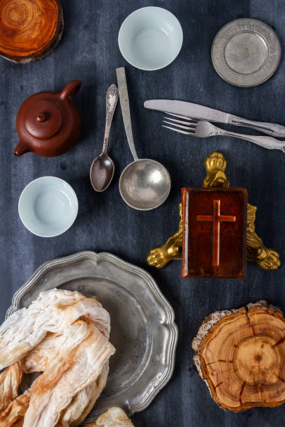 istock Various antique vintage dishes on black background 2151428561