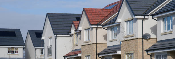 istock New housing development and owners cars parked outside 2151433089