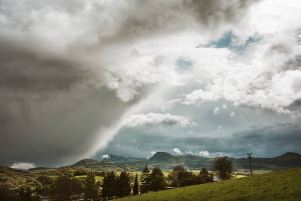 istock Spring nature, rain clouds on sky. Spring or autumn weather. 2151433107