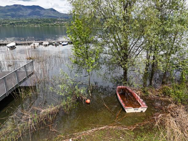 istock Abandoned Boat on lake 2151434668
