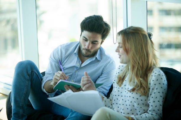 istock Business partners taking and working in the office 2151435267