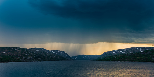 Valevatn in Norway with a rain cloud
