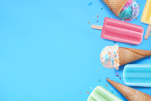 istock Pastel ice cream cones and popsicle side border on a blue background 2151445775