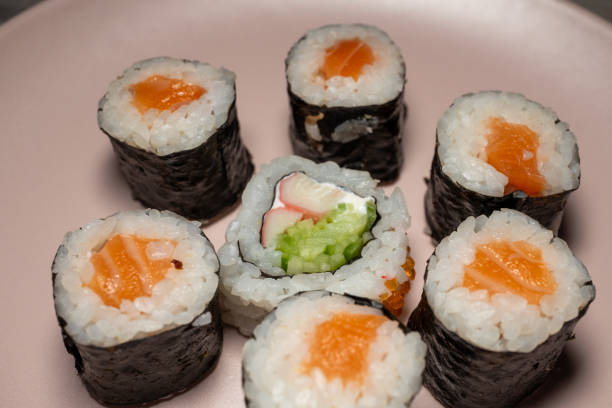 istock Philadelphia roll sushi on a 360 degree rotating table 2151445986