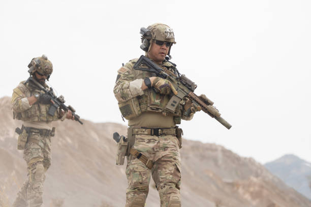 istock Soldiers patrol in 2151450228