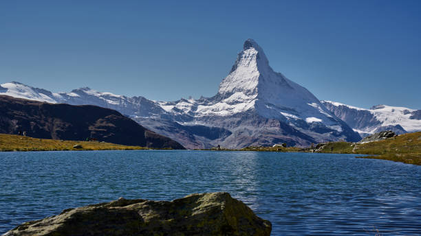istock Matterhorn peak in the Swiss Alps 2151451380