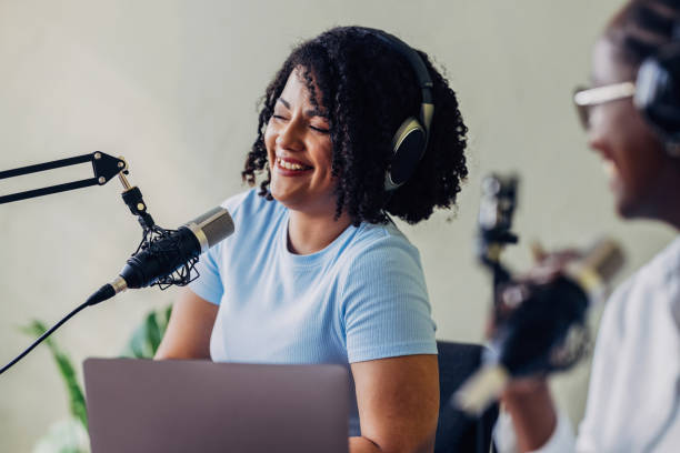 istock Two Women Recording a Podcast in a Studio Setting 2151451924