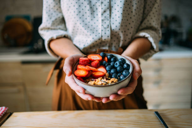 istock Healthy Breakfast Bowl With Fresh Berries and Granola 2151453409