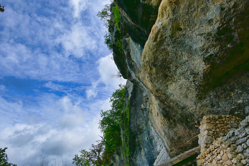 Limestone cliff in the Vezere valley in the Dordogne, France