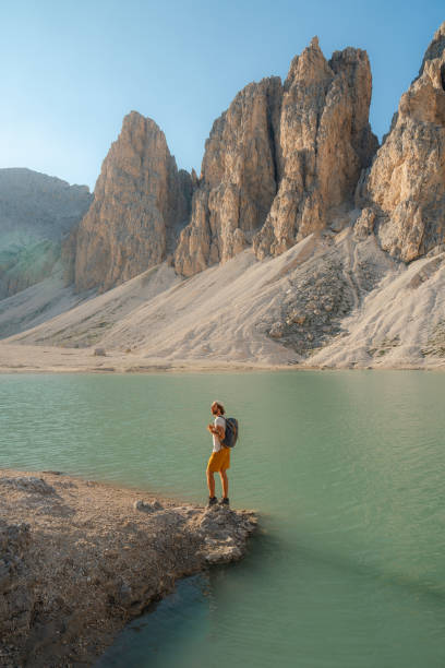 istock Man near Antermoia lake in Dolomites in summer 2151463721