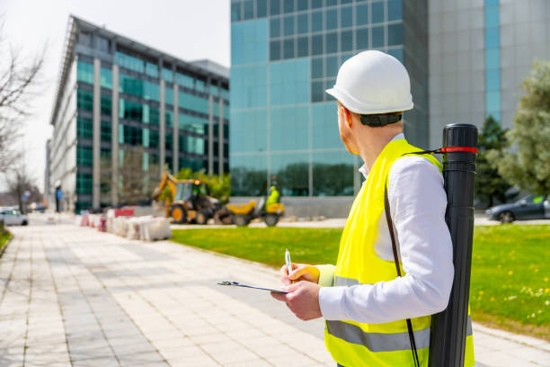 istock Architect supervising remodeling works in the city 2151467016