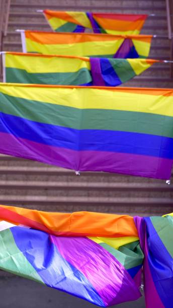 istock LGBTQIA Rainbow flags on the street 2151469651