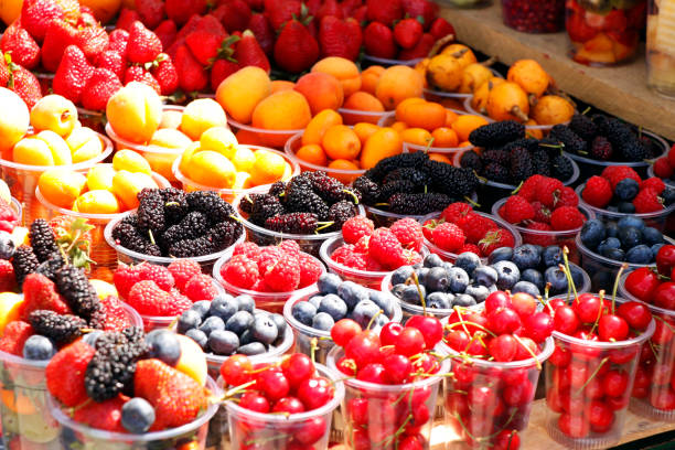 istock assorted fresh berries (berry) fruits in a street stall for sell 2151476183