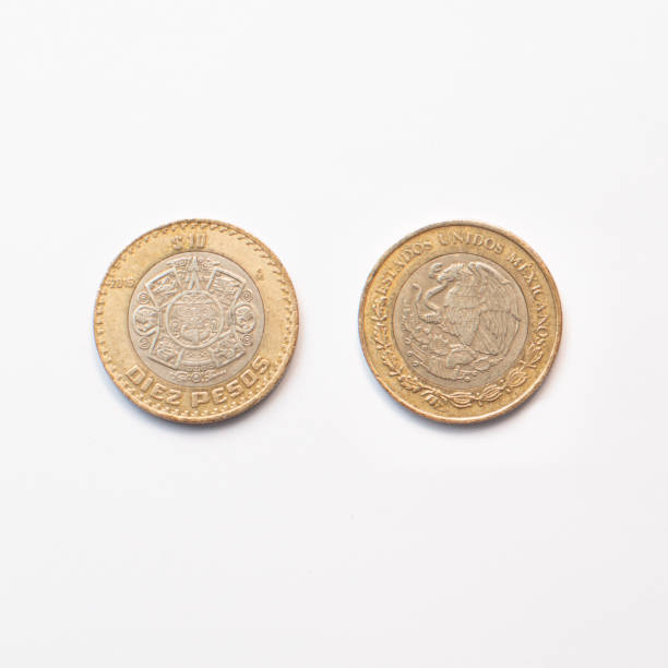 istock Ten Mexican peso coin on an isolated white background 2151479840