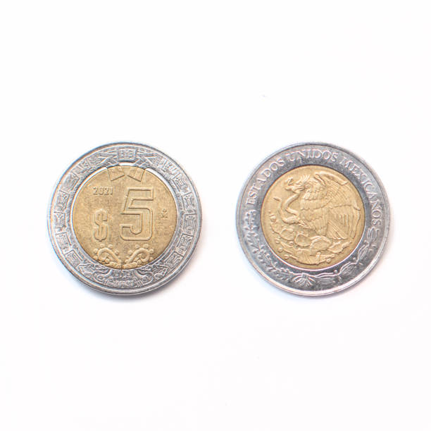 Image on isolated white background of a five Mexican peso coin from both sides in overhead view