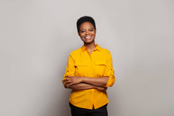 istock Perfect successful woman smiling and having fun against studio wall banner background 2151484364