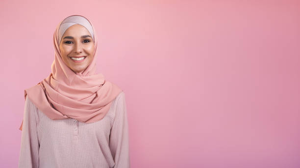 istock Happy woman optimistic emotion smiling face pink 2151484460