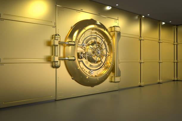 istock Golden bank vault door closed 2151485093