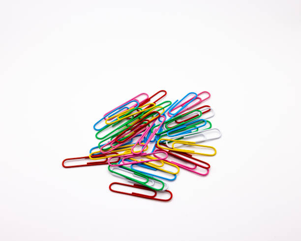 istock a bunch of paper clips next to each other on a white background 2151488078