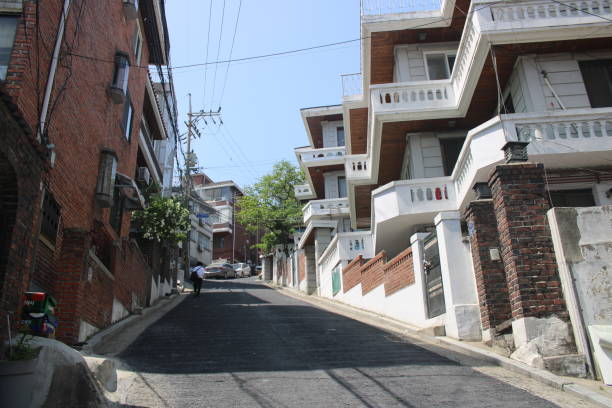 Seoul, Korea-May 3, 2024: Sloping alleyway lined with traditional villa buildings, in Noksapyeong, Seoul