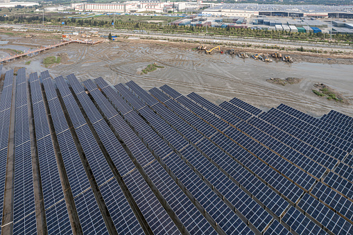 Aerial view of the mudflat site where photovoltaic solar panels are installed