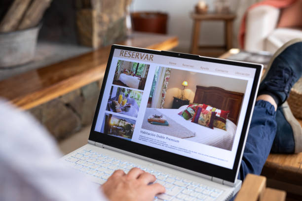 istock Unrecognizable person reviewing hotels online, using laptop 2151496340