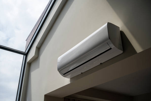 istock Air conditioner on white wall room interior background 2151503959