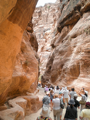 Wadi Musa, Jordan, April 18, 2008 : A large number of the tourists walk along the Al Siq gorge of the Petra historical reserve in the Wadi Musa city in Jordan