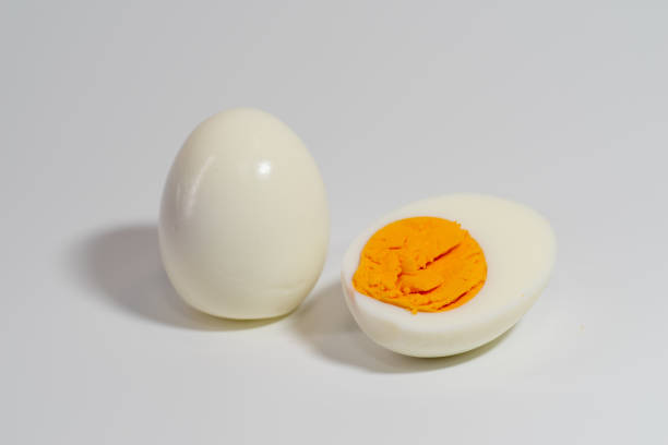 istock Piece of boiled egg. Isolated over white 2151509619