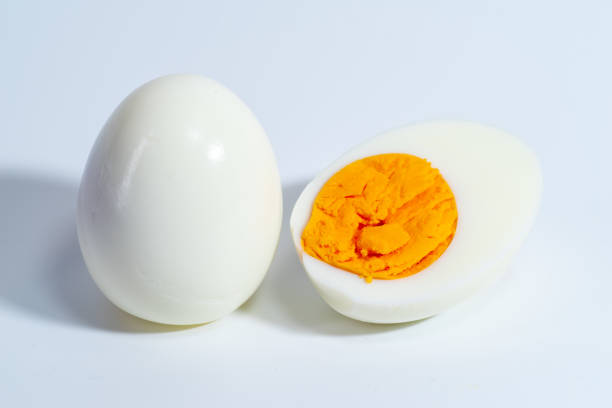 istock Piece of boiled egg. Isolated over white 2151509622