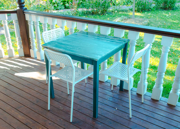 istock Blue wooden table in a summer cafe 2151514816
