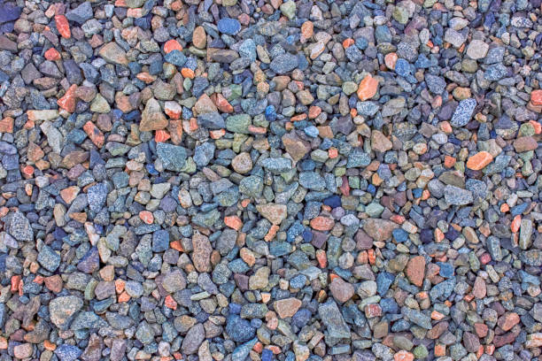 Abstract image of masses of tiny pebbles used in gardening. The tiny stones in different colours create a lovely background pattern.