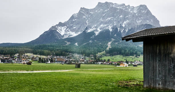 istock Majestic Zugspitze mountain overlooking alpine town 2151515813