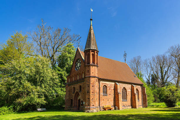 istock Chapel with meadow and trees in Althof, Germany 2151516170