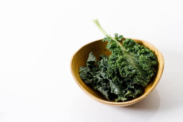 istock Fresh green Kale leaf salad vegetable on white background 2151516817