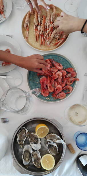 istock oysters and prawns as  seafood lunch 2151521402